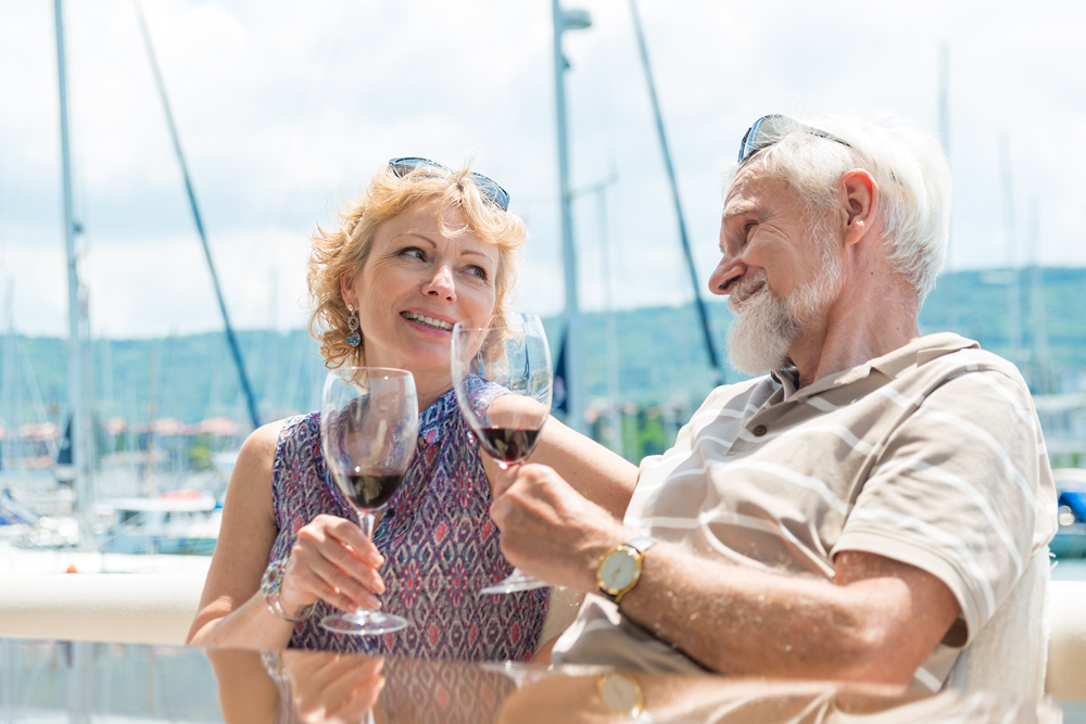 Senior couple enjoying on a yacht
