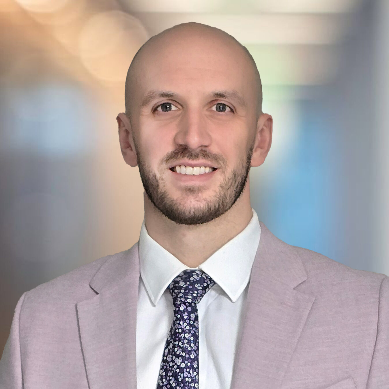 Modern office corridor with walls of glass defocused background. Greg West - Mortgage and Protection Adviser